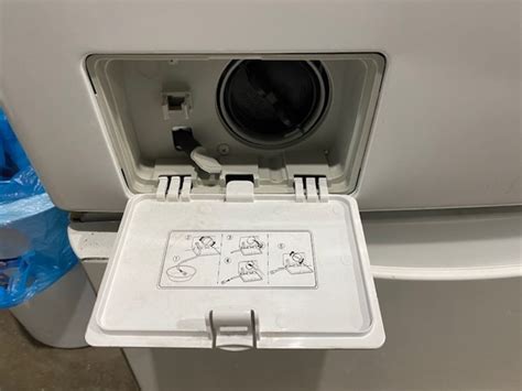 How to drain water from lg top load washing machine